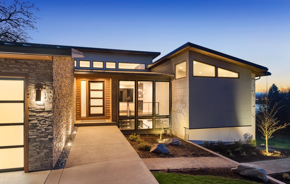 Beautiful,modern,style,luxury,home,at,sunset,,featuring,entrance,and