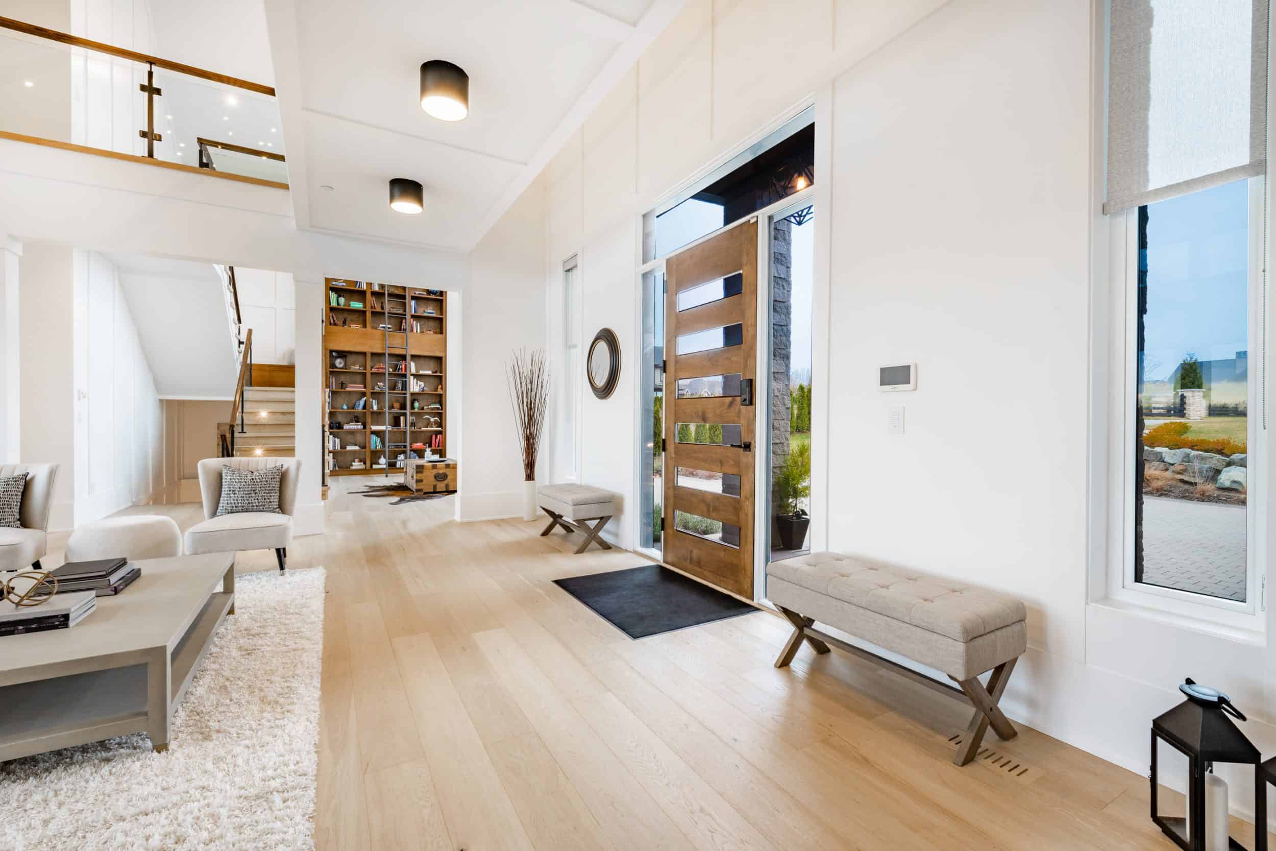 Open-plan living area with fireplace and exposed timber beams
