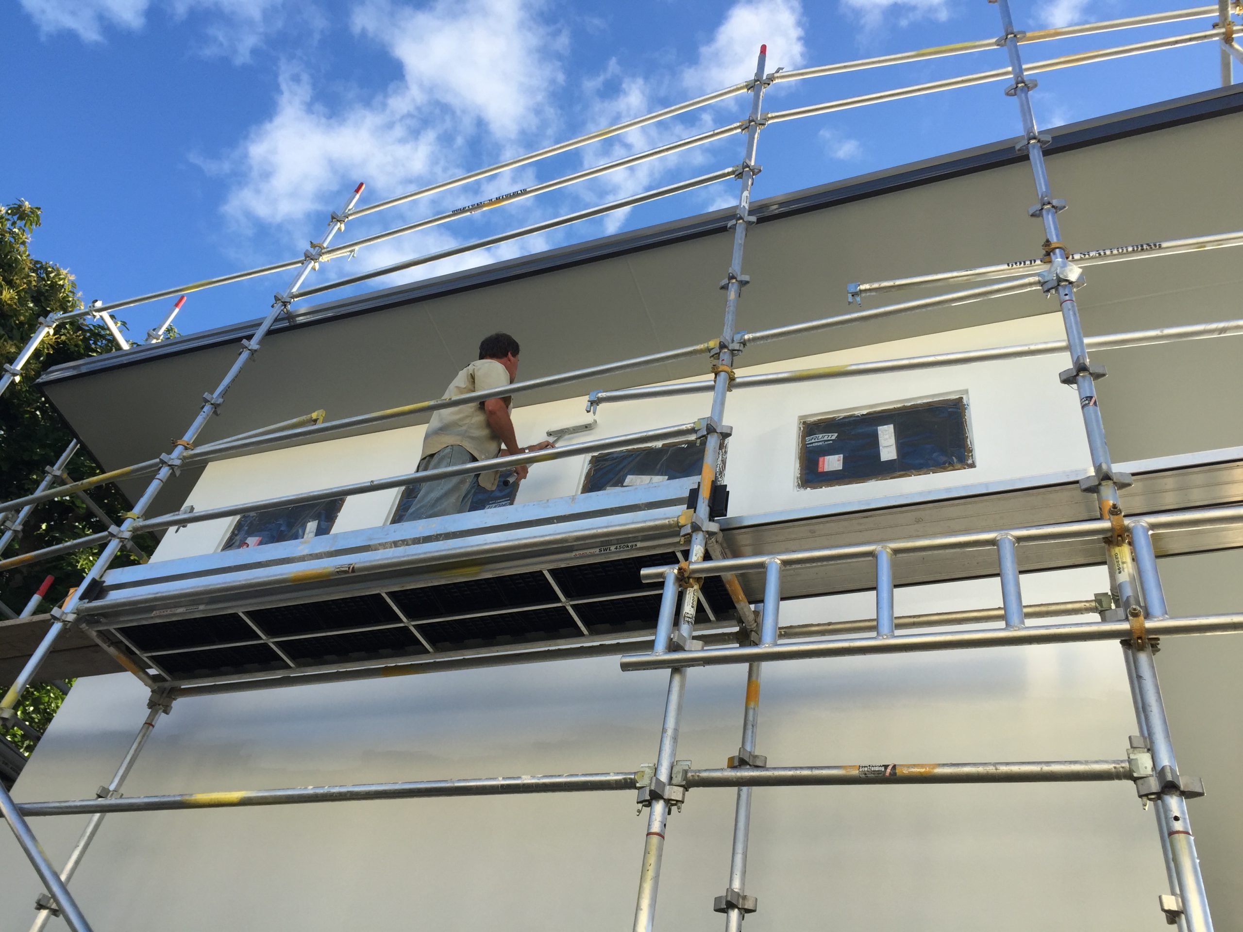 Scaffolding and new exterior cladding being installed on Gold Coast renovation project