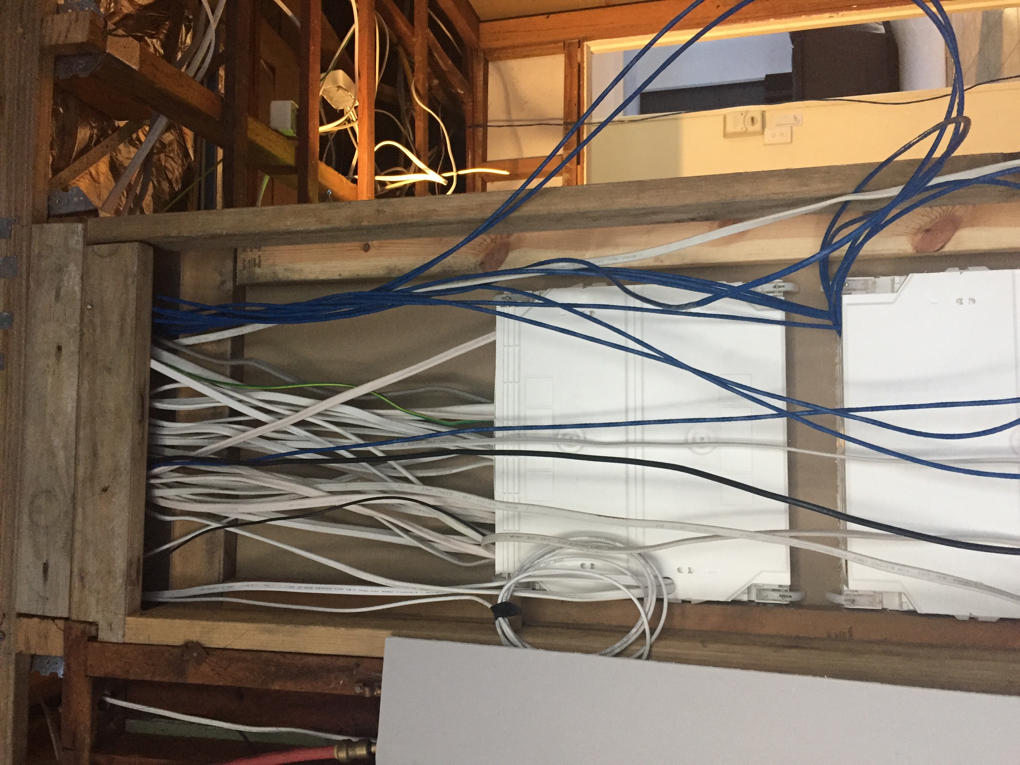 New switchboard with CAT6 data cables and electrical wiring during first-fix stage of Southport home renovation